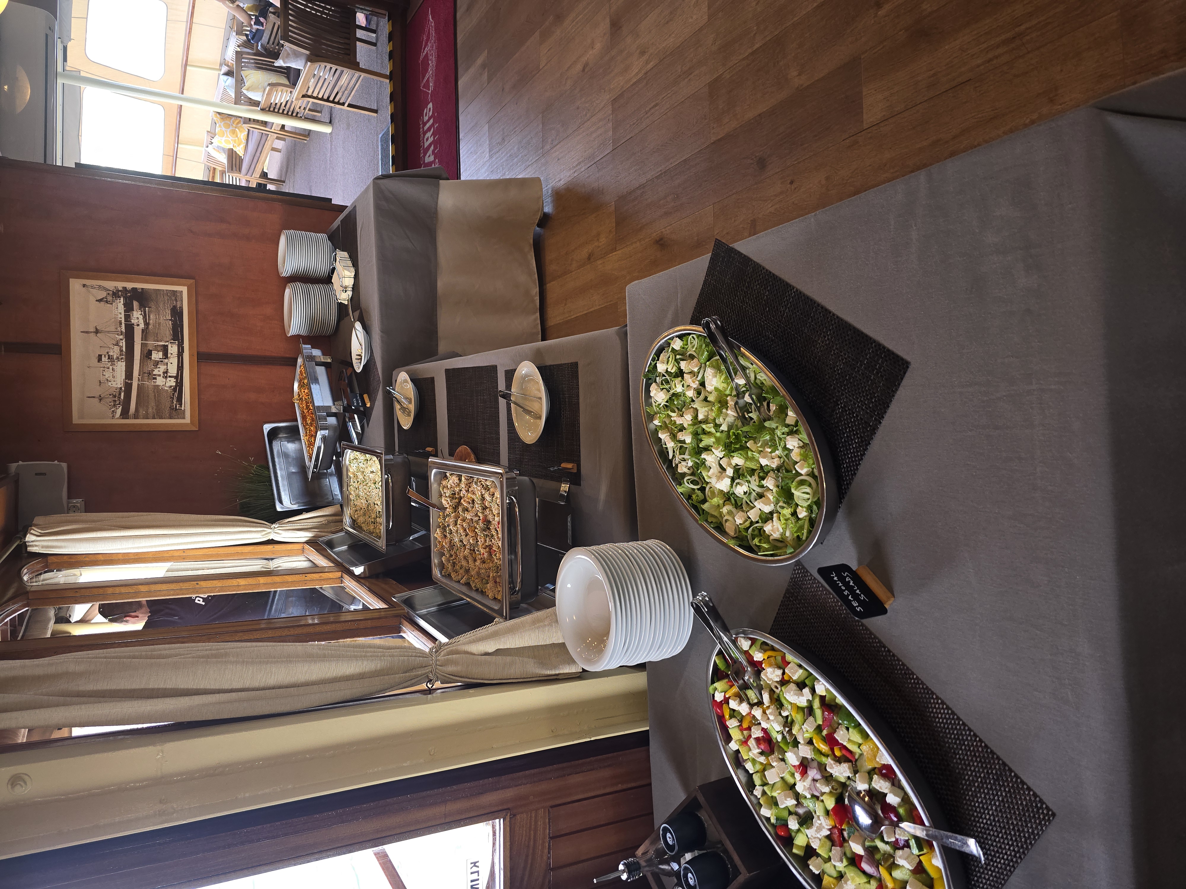 Buffet of seasonal salads with feta and fresh vegetables aboard Polaris