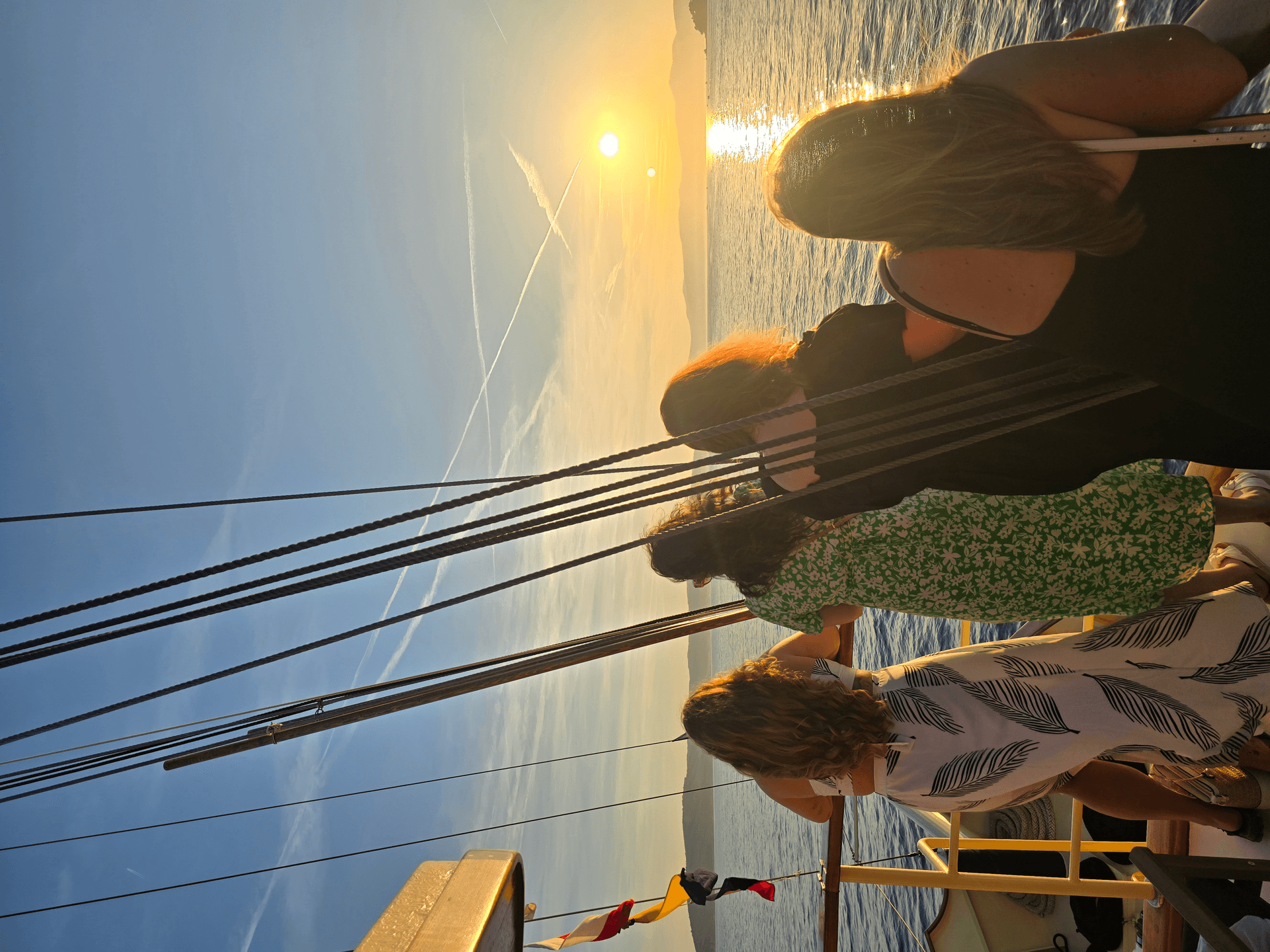 Guests at the rail of Polaris watching the sunset over the Adriatic